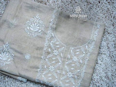 Beige tussar chikankari material with white embroidered yoke