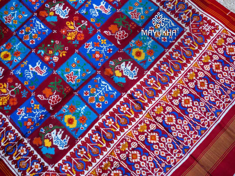 Double ikkat red Patan Patola with motifs in a square pattern