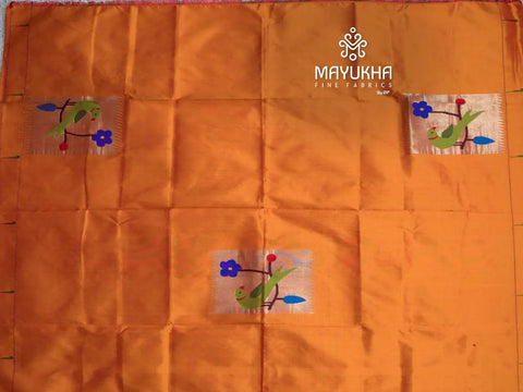 Mustard silk paithini blouse with red muniya border and parrot motifs