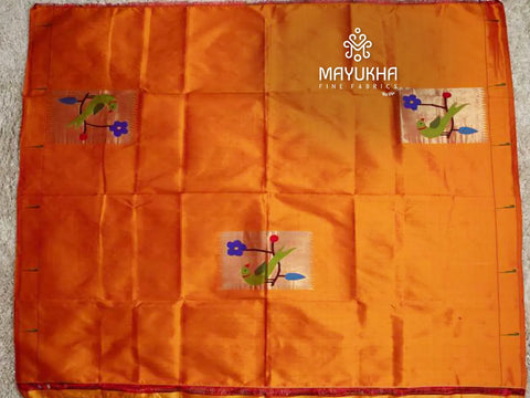 Deep mango silk paithini blouse with floral motifs