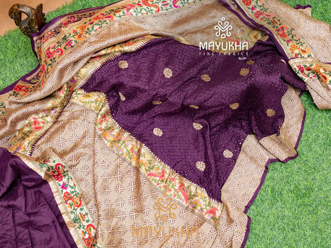 Grand maroon banarasi saree with bandhej work gold motifs