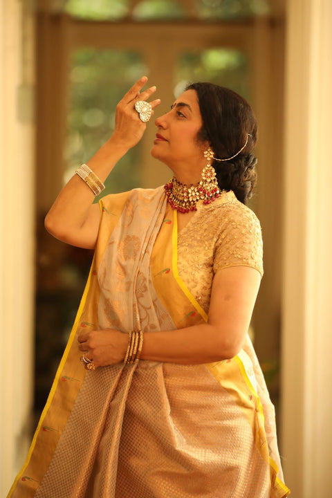 Lemon yellow zarikota and paithani fusion with all over zaal work, silver paithani border and gold paithani pallu