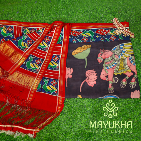 Navy blue double ikkat Patan Patola and pen kalamkari saree with divine figure motifs Mayukhafabs