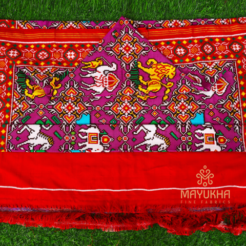 Rust brown double ikkat Patan Patola saree with animal motifs. Mayukhafabs