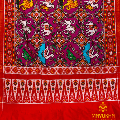 Rust brown double ikkat Patan Patola saree with animal motifs. Mayukhafabs